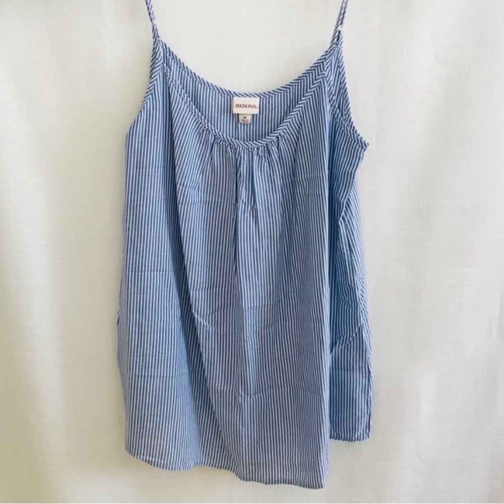 White and light blue super soft striped cami with adjustable straps.